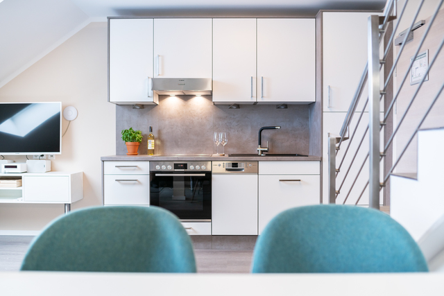 Küche in den Apartments