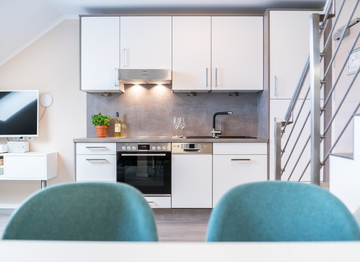 Küche in den Apartments