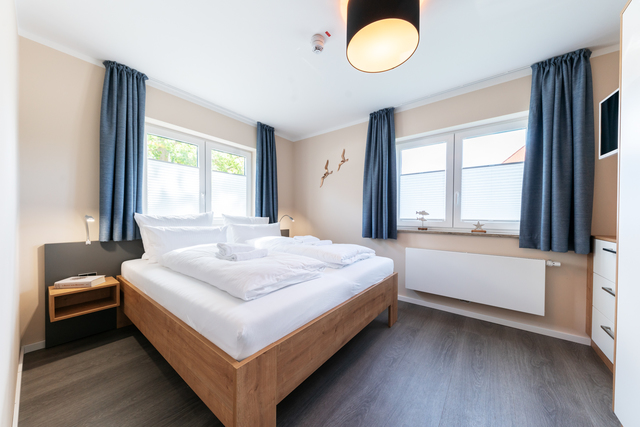 Eines der gemütlichen Schlafzimmer in unseren Apartments